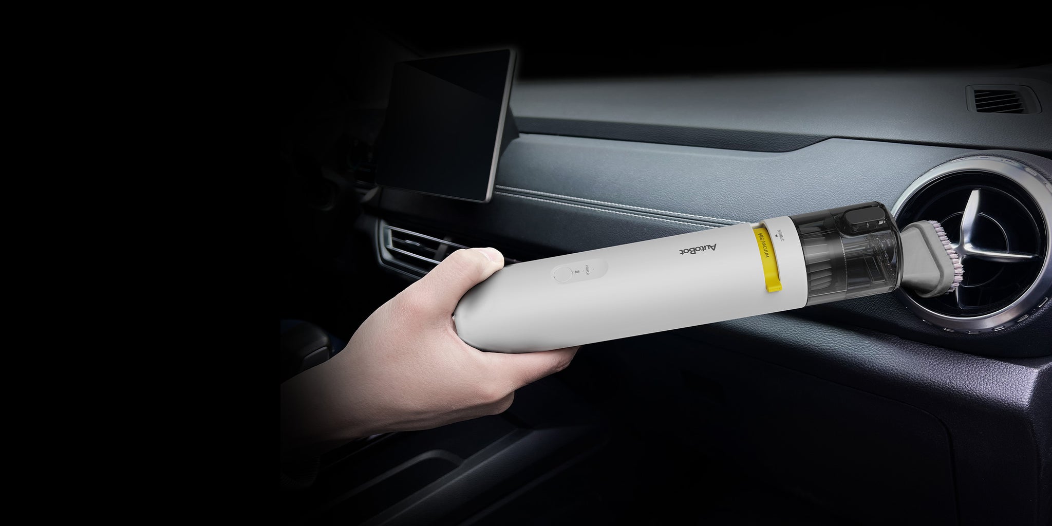 AutoBot vacuum cleaning pet hair from car interior with powerful suction